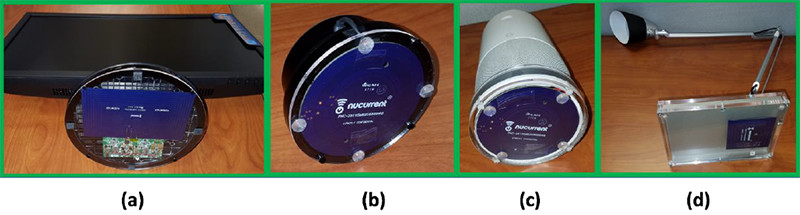 図4. 小型で安価なアンテナは、無線で給電されるさまざまな負荷の受電器として使われます。ここに示されているものは、台湾のASUSの21インチのモニター（a）、アマゾンのEcho Dot（b）、米グーグルのCortana（c）、卓上灯（d）です。